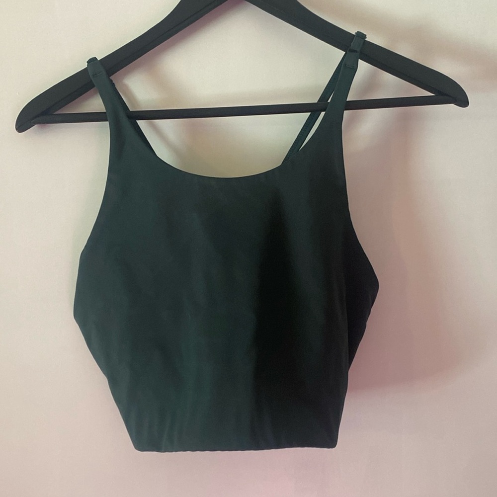 Girlfriend Collective dark green sports bra.